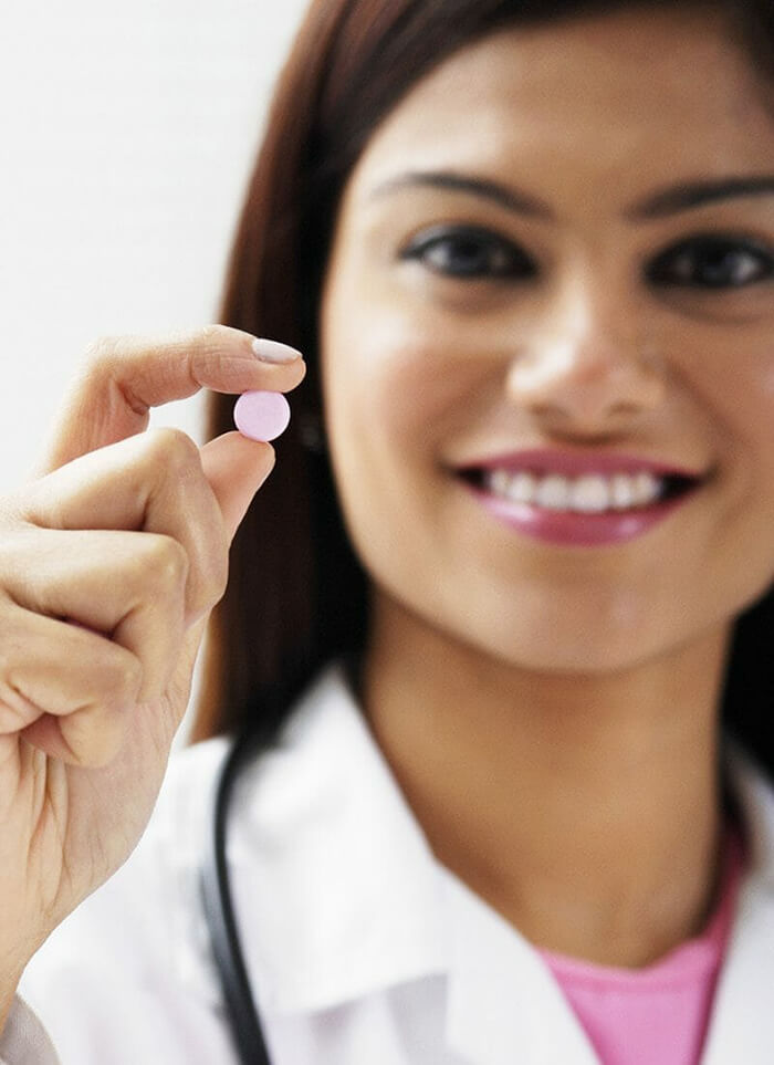 Woman holding tablet Image of woman holding a pink tablet